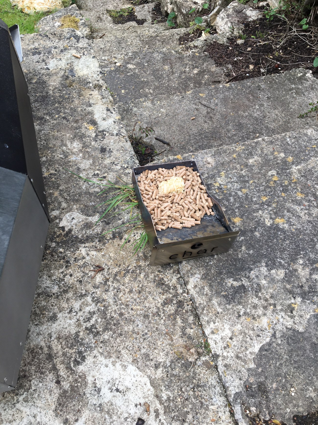 Pellets and hopper (tray) to be placed in oven